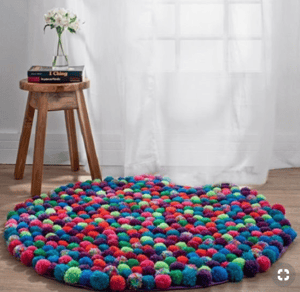 Cozy and Plush Rug | 15 Ways to Decorate Your Dorm Without Breaking the Bank