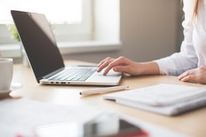 lady on laptop getting professional certificates