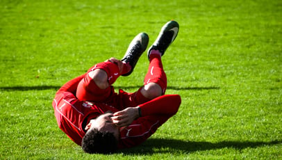 soccer player with cramp