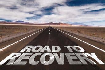 Road to Recovery written on desert road | Addiction Counseling Degree Programs | National Recovery Month Celebrates 30 Years